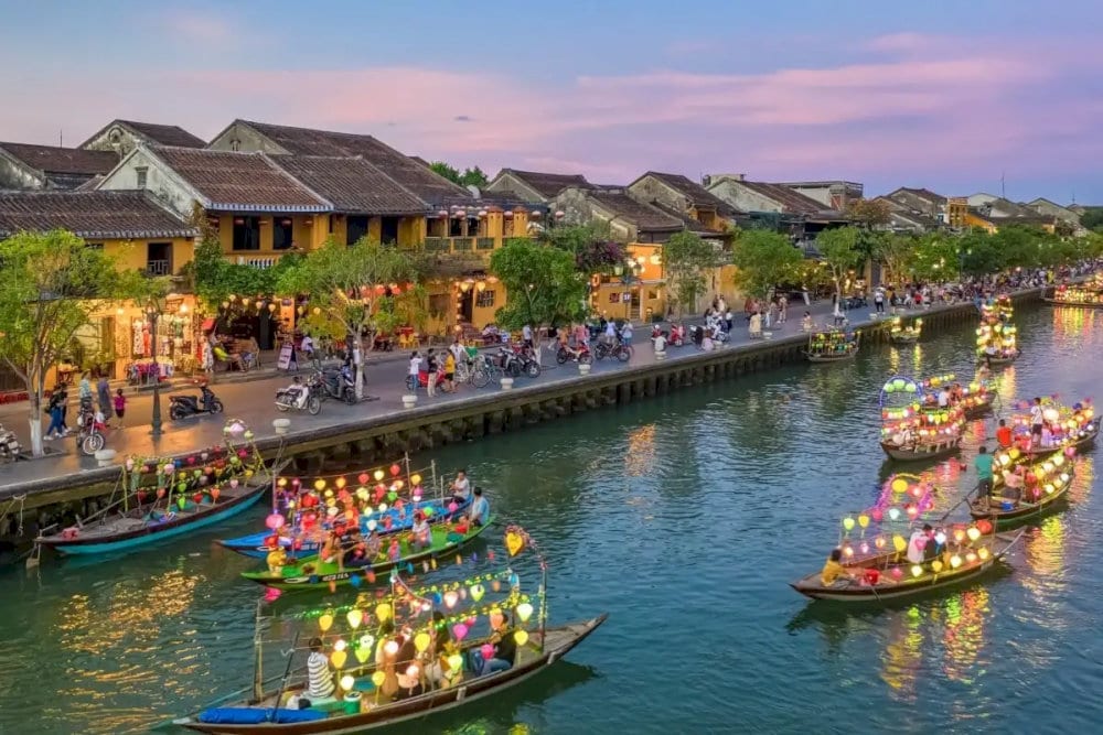Take a sunset boat trip along Thu Bon River to escape the daytime heat and admire the scenic waterways of Hoi An